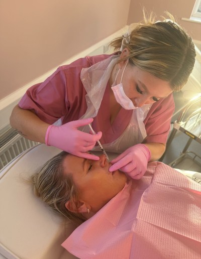 An aesthetics procedure being carried out by an experienced aesthetician